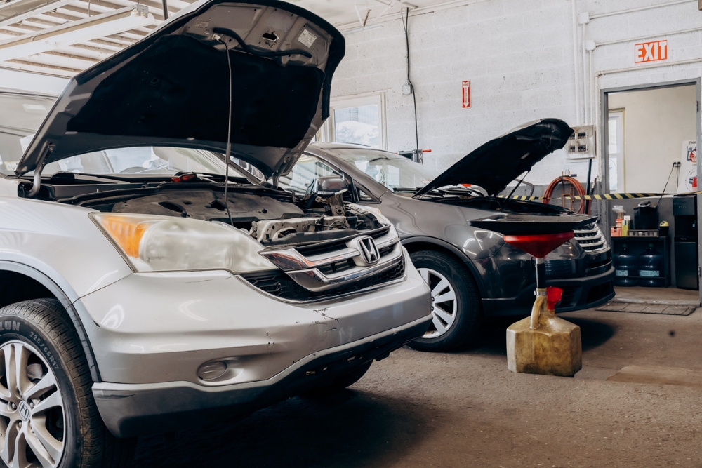 Car Maintenance In Westfield, MA At LaFlamme's Auto & Truck Services. Cars inside an auto repair shop for maintenance services
