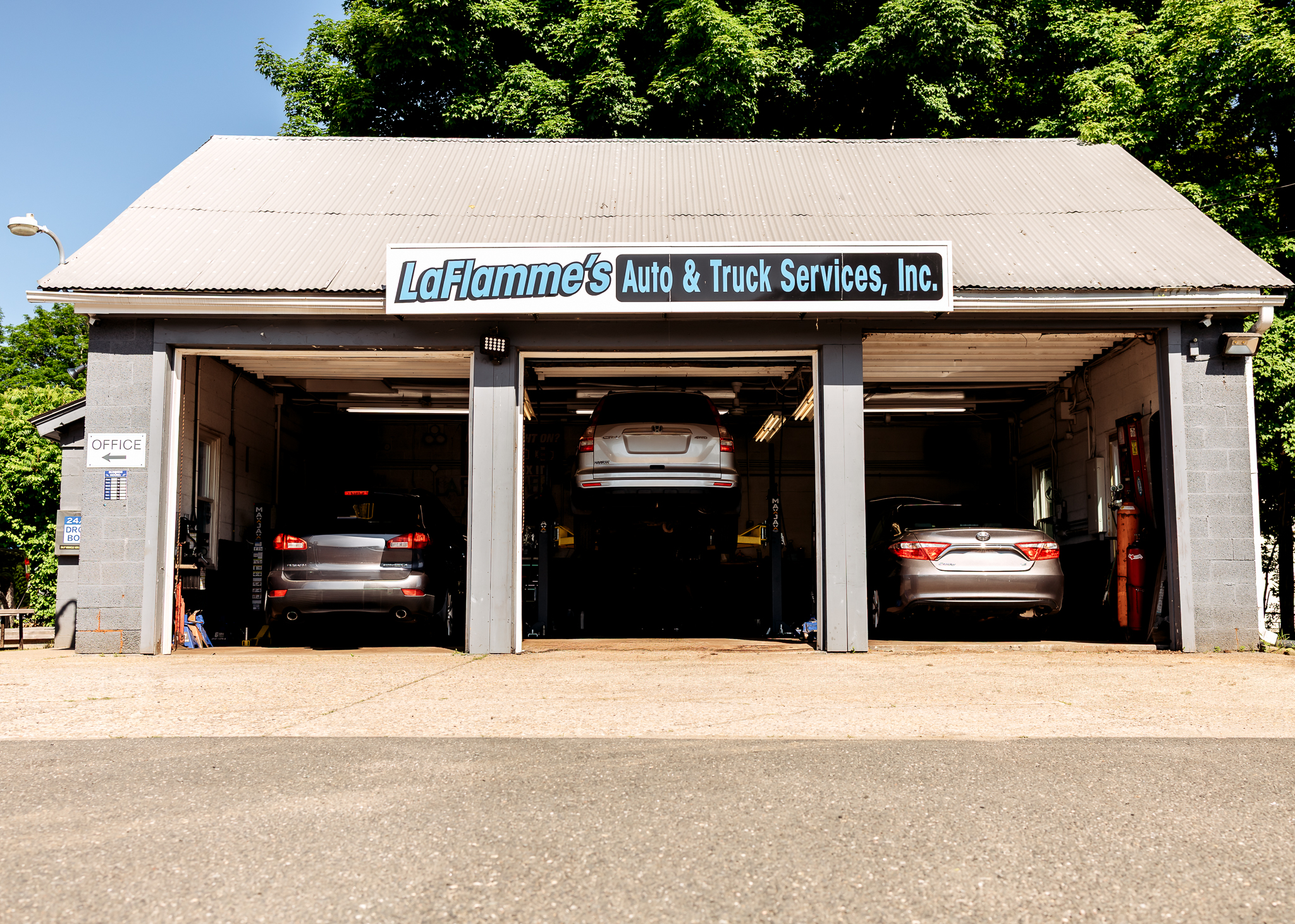Auto Repair Shop in Westfield MA At LaFlamme's Auto & Truck Services. Exterior view of a auto repair shop front in Westfield, MA.