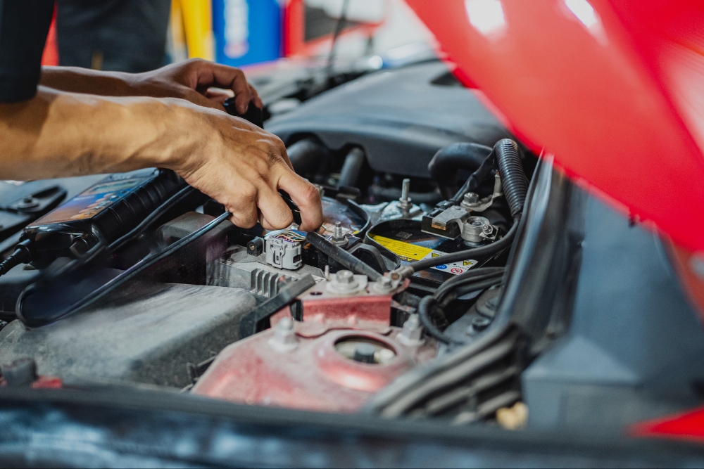 Car Electrical System, Auto Electrical Repair Services in Westfield, MA At LaFlamme's Auto & Truck Services. Close-up view of a vehicle’s electrical system in auto repair shop